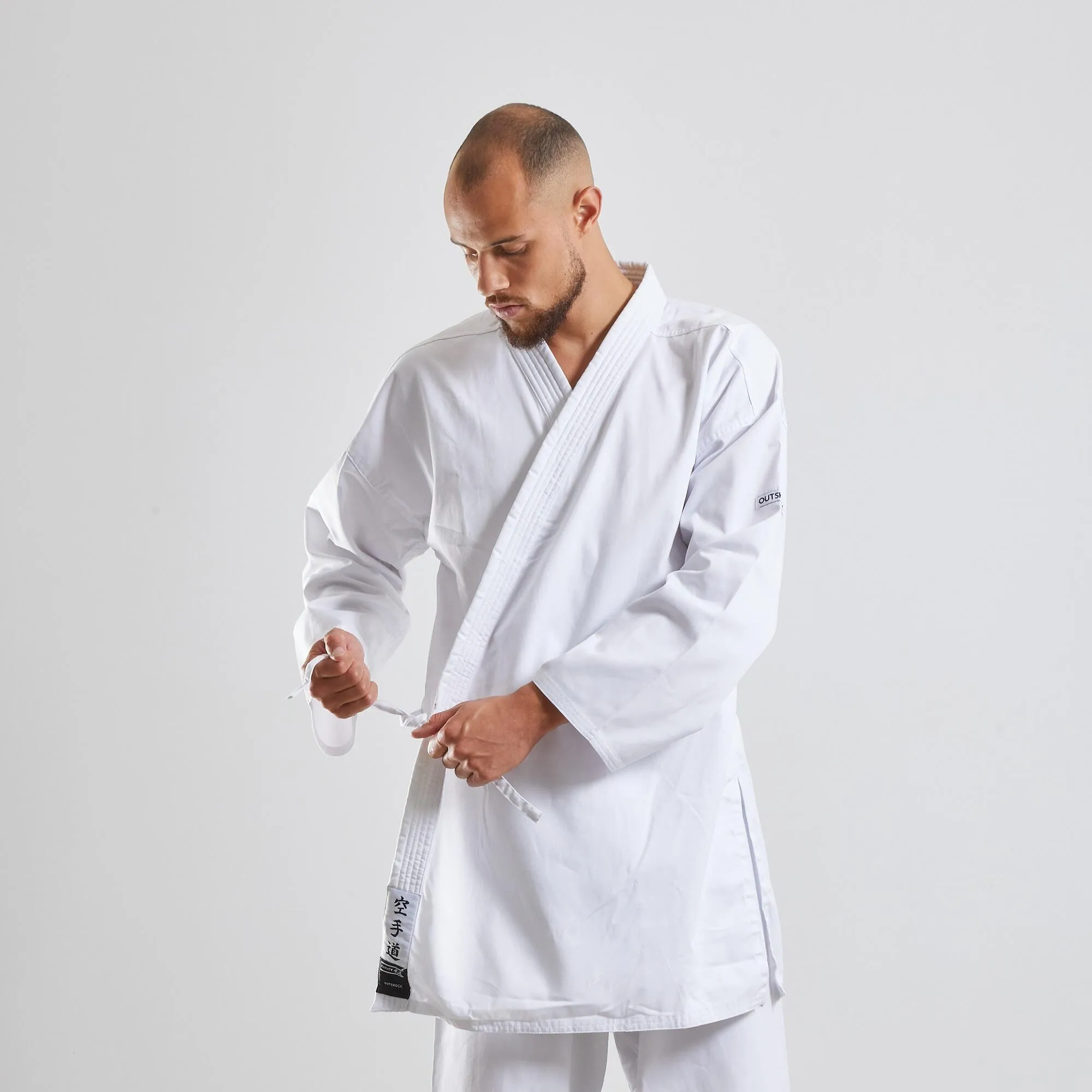 Karate uniform adults 100 (without belt) OUTSHOCK, white